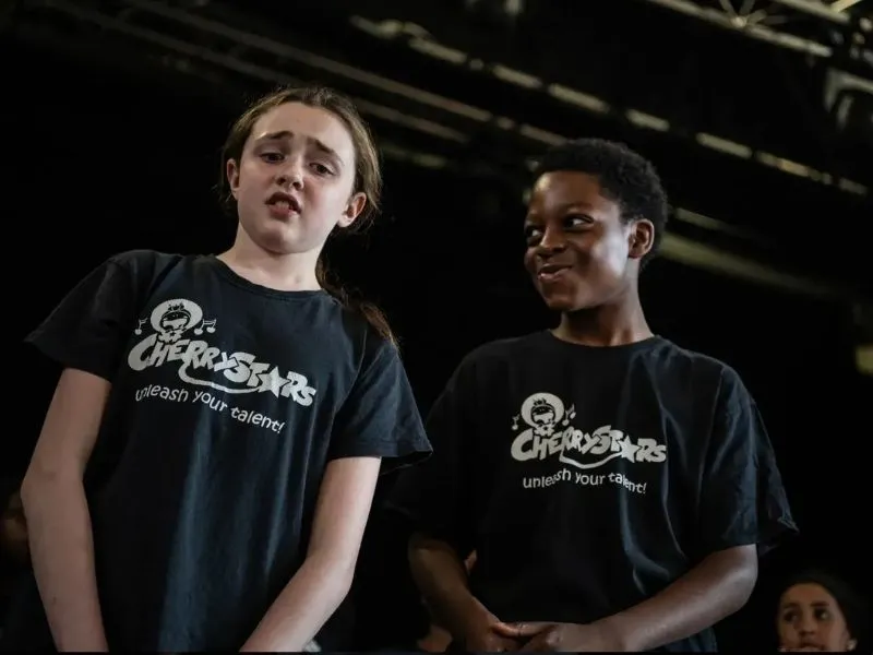 Cherry Stars students in uniform T-shirts
